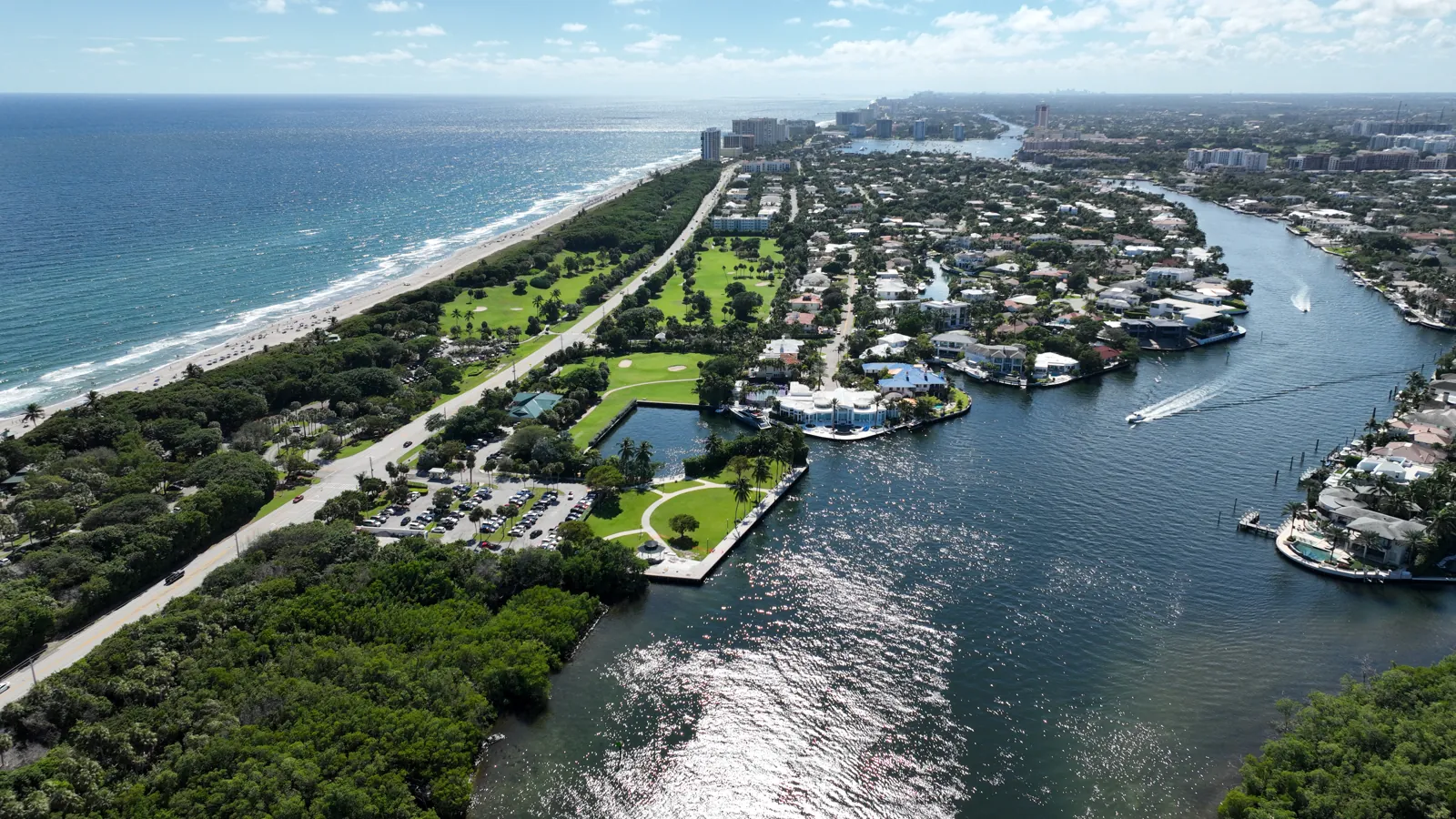 Aerial of barrier-island coastline with Atlantic beach, golf course, Intracoastal Waterway and waterfront estates