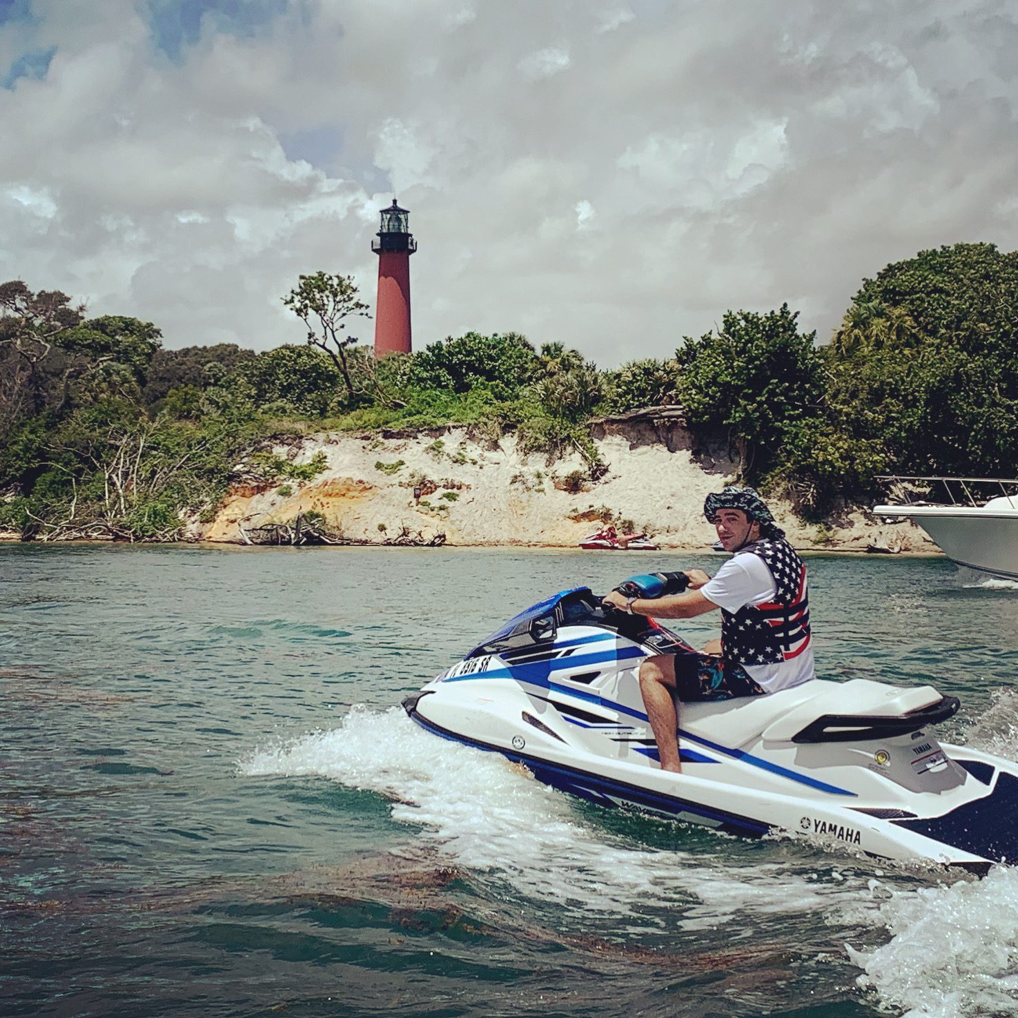 Jet ski near the Jupiter lighthouse