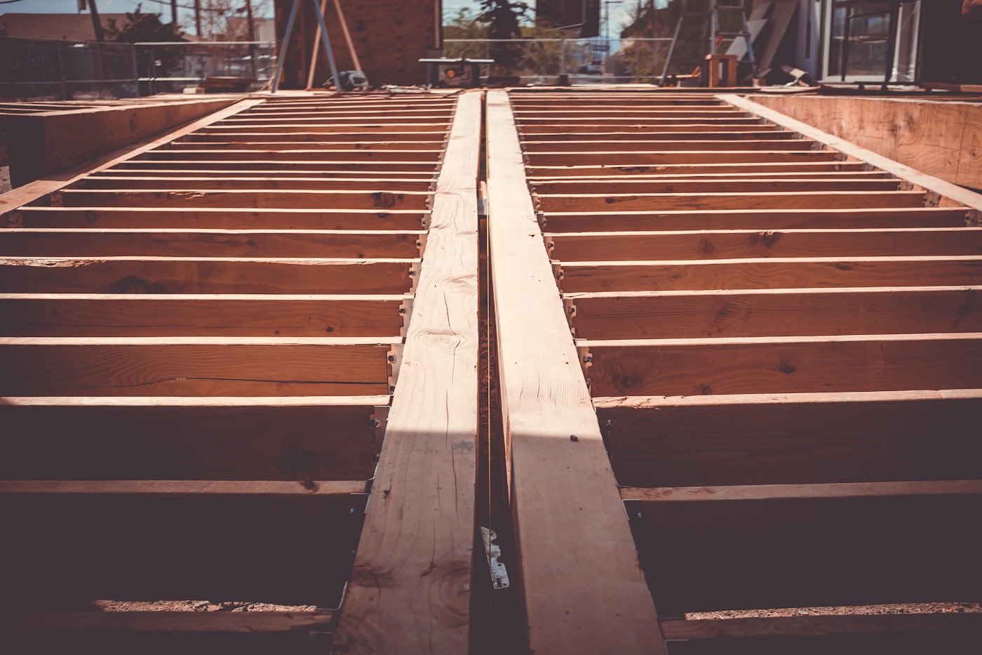 House under construction, floor framing in place