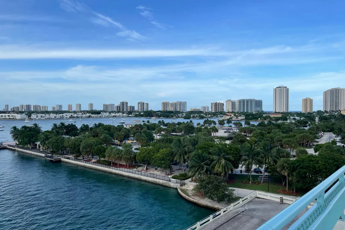 Looking east from the Blue Heron Bridge over Phil Foster Park's seawall and the Lake Worth Lagoon to the high-rises of Singer Island